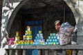 Young woman sells groceries at a small business in northern Haiti.