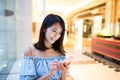 Young Woman sending sms on mobile phone Royalty Free Stock Photo