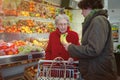 Young woman and senior woman in the supermarket Royalty Free Stock Photo