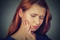 Young woman with sensitive toothache crown problem about to cry from pain Royalty Free Stock Photo