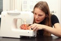 Young woman sewing Royalty Free Stock Photo