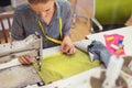 Young woman with sewing machine Royalty Free Stock Photo