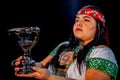 young woman Shaman ,with sahumerio in the hands , curandera, Olmec facilitator, Teotihuacana, Xicalanca - Toltec in black