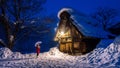 Young woman in Shirakawa-go village in winter, UNESCO world heritage sites, Japan