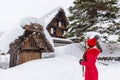 Young woman in Shirakawa-go village in winter, UNESCO world heritage sites, Japan Royalty Free Stock Photo