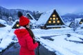 Young woman in Shirakawa-go village in winter, UNESCO world heritage sites, Japan Royalty Free Stock Photo