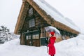 Young woman in Shirakawa-go village in winter, UNESCO world heritage sites, Japan Royalty Free Stock Photo