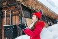 Young woman in Shirakawa-go village in winter, UNESCO world heritage sites, Japan Royalty Free Stock Photo