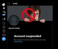 A young woman is shocked and trying to hang onto her generic social media account that was suspended Royalty Free Stock Photo