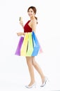 Young Woman with shopping bags and credit card Royalty Free Stock Photo