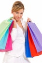 Young woman with shopping bags standing isolated Royalty Free Stock Photo