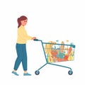 Young woman with shopping cart full of food and drinks Royalty Free Stock Photo