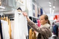Young woman shopping in a fashion store Royalty Free Stock Photo