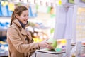 Young woman shopping for fruits and vegetables Royalty Free Stock Photo