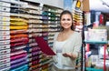 woman shopping multicolored paper