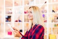 Young woman shopping online with tablet computer and credit card Royalty Free Stock Photo