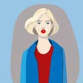 A young woman with short blonde hair and red lipstick, wearing a blue jacket and a red blouse. The expression on her face is Royalty Free Stock Photo