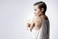 Young woman, short hair, celebrating with champagne. New Year, Christmas concept Royalty Free Stock Photo