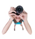 Young woman in shorts photographed something compact camera. Royalty Free Stock Photo