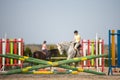 Young woman show jumping Royalty Free Stock Photo