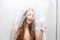 Young woman showering