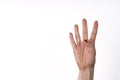 Young woman showing four fingers with hand Royalty Free Stock Photo