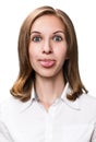 Young woman showing grimace with tongue Royalty Free Stock Photo