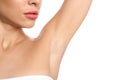 Young woman showing hairy armpit on background, closeup. Epilation procedure Royalty Free Stock Photo