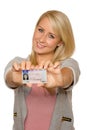 Young woman showing her driver's license