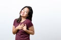 Young woman showing her heartfelt gratitude Royalty Free Stock Photo