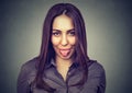 Young woman showing her tongue Royalty Free Stock Photo