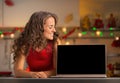 Young woman showing laptop blank screen Royalty Free Stock Photo