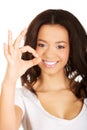 Young woman showing perfect sign. Royalty Free Stock Photo