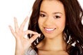 Young woman showing perfect sign. Royalty Free Stock Photo