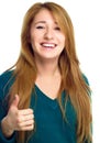 Young woman is showing thumb up gesture Royalty Free Stock Photo