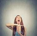 Young woman showing time out hand gesture, frustrated screaming Royalty Free Stock Photo