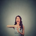 Young woman showing time out hand gesture, frustrated screaming Royalty Free Stock Photo