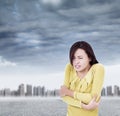 Young woman shudder and tightening body in outdoors Royalty Free Stock Photo