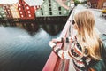 Young woman sightseeing Trondheim city from bridge Royalty Free Stock Photo