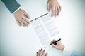 Young woman signing a last will and testament document Royalty Free Stock Photo