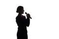 Young woman singing into the microphone Royalty Free Stock Photo