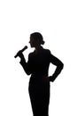 Young woman singing into the microphone Royalty Free Stock Photo