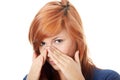 Young woman with sinus pressure pain Royalty Free Stock Photo