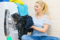 Woman doing black clothes laundry