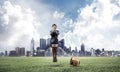 Young woman sitting on big light bulb Royalty Free Stock Photo