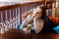 Young woman sitting in cafe Royalty Free Stock Photo