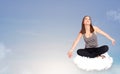 Young woman sitting on cloud with copy space Royalty Free Stock Photo