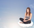 Young woman sitting on cloud with copy space Royalty Free Stock Photo