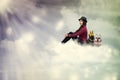 Young woman sitting on the cloud with dogs