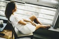 Young woman sitting and daydreaming Royalty Free Stock Photo